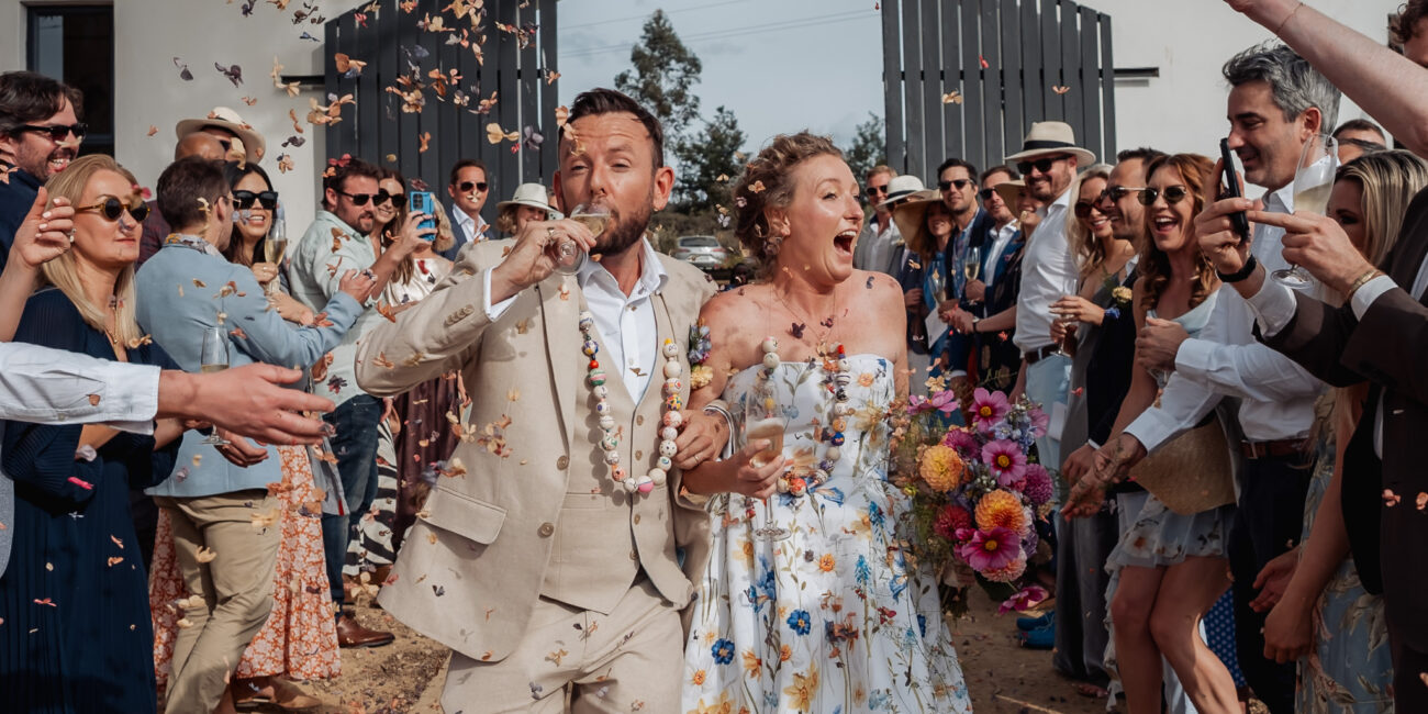wedding couple confetti walk